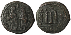 Phocas and Leonita. (602-610 AD) Æ Follis. Theoupolis. Obv: Phocas and Leonita standing facing. Rev: ANNO / M. 28mm, 9,74g