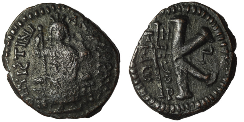 Justinian I. (527-565 AD) 1/2 Follis. Theoupolis. Obv: Justinian sitting enthron...