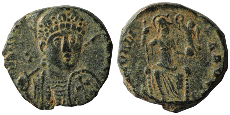 Arcadius. (401-403 AD). Follis. Obv: DN ARCADIVS PF AVG. helmeted bust of Arcadi...