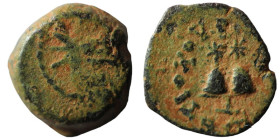 Seleucid Kingdom. Antiochos VII. Euergetes. (138-129 BC). Bronze Æ. (14mm, 1,78g) Antioch. Obv: caps of discouri. Rev: prow. artificial sandpatina.
