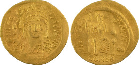 The Byzantine Empire
Justin II. Constantinople. Circa 565-578. AU solidus 4.50 g. DN IVSTINVS PP AVG, helmeted facing bust, holding Victory on globe /...