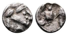 Eastern Celtic Tribes. Late 2nd. Century BC. AR Obol ( 7mm, 0.35g,). Celticized head of Zeus. Rev. Rider. Almost Extremely Fine for this very difficul...