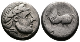 Middle Danube Tribes ''Kugelwange" type. AR Tetradrachm (20,3mm. 9,7g.). Imitating the types of Philip II of Macedon. 3rd. Century BC. Celticized laur...