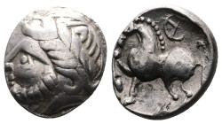 Middle Danube Tribes ''Kugelwange" type. AR Drachm (13,5mm, 2,50g.) Imitating the types of Philip II of Macedon. 3rd. Century BC. Celticized laureate ...