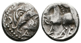 Middle Danube Tribes ''Kugelwange" type. AR Drachm (13,3mm. 2,37g.). Imitating the types of Philip II of Macedon. 3rd. Century BC. Celticized laureate...