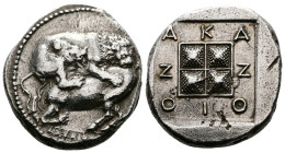 Macedon. Akanthos. AR Tetradrachm (23,9 mm. 14,2 g) Circa 424-390 BC. Lion, right, attacking bull kneeling to left, biting into his hindquarter. Magis...