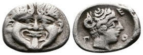 Macedon. Neapolis. Circa 424-350 BC. AR Hemidrachm (15 mm, 1.8 g.). Facing gorgoneion with protruding tongue. Rev. Ν-Ε / Ο-Π Head of the nymph of Neap...