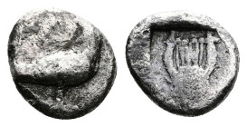 Macedon. Olophyxos. Circa 450 BC. AR Obol ( 7 mm, 0.50 g.). Eagle standing to right. Rev. Lyre within deep incuse square. SNG Copenhagen 145 (as Delph...
