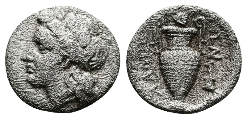 Thessaly, Lamia. AR Obol circa 360-350 AD. (10,7mm. 0,75g.). Head of Dionysus l....