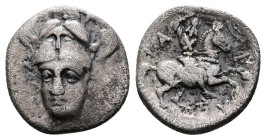 Thessaly, Pharsalos. Early-mid 4th. Century BC. AR Trihemiobol (11,3mm, 1.33 g.). Helmeted head of Athena Parthenos facing, her head turned slightly t...
