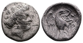 Euboia, Chalkis. Circa 338-308 BC. AR Drachm (15,4mm. 3,23g.). Head of the nymph Chalkis right. Rev. Eagle with spread wings, grappling with serpent; ...
