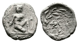 Peloponnesos. Sikyonia, Sikyon. Circa 400-350 BC. AR Tritartemorion or ¾ obol (10mm, 0.47 g.). Archaic figure of Apollo kneeling to right, holding bow...