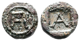 Argolis. Argos. 4th-3rd Century BC. AE Tessera (12mm. 2,02 g.). FI within linear circle. Rev. A within shallow incuse square. BCD Peloponnesos 1122.1-...