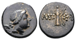 Pontos. Amisos. Time of Mithradates VI, ca. 95-90 or 80-70 BC. AE (16,5 mm, 3,92 g.) Winged bust of Eros or Nike? to right. Rev. AMI-ΣOY Quiver. SNG B...