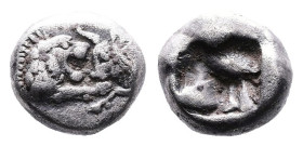 Kings of Lydia, Kroisos. Circa 560-546 BC. AR 1/12 Stater (8mm, 0.89g.). Confronted foreparts of lion right, with extended right foreleg, and bull lef...