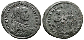Diocletian, AD 284-305. AE Follis. (28,3mm. 8,4 g.). Rome. DN DIOCLETIANO FELICISS SEN AVG, laureate bust right wearing consular mantle, holding olive...