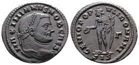 Galerius, AD 293-305. AE folles. (29,1 mm. 10,6 g.). Siscia. MAXIMIANVS NOB CAES, laureate head right. Rev. GENIO POPVLI ROMANI, Genius standing left,...