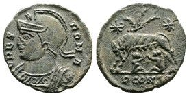 City Commemorative issue, AD 309-337. AE Follis (17,7mm. 2,2 g.). Arles. VRBS ROMA, helmeted bust of Roma left. Rev. She-wolf standing left, suckling ...