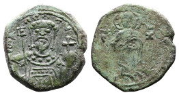 John II. AD 1118-1143. Half tetarteron. (15,6 mm. 2 g.). Thessalonica. IC-XC across fields, Christ standing facing, holding book of gospels, Rev. IW Δ...