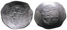 Isaac II. AD 1183-1185. Billon Trachy (27,7 mm. 3 g). Constantinople. MP-Θ V to left and right of Mary, nimbate, seated facing, holding before her the...