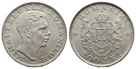 Mihai I (1940-1947) 200 Lei (24mm, 6,08g.). 1942 MIHAI I REGELE ROMANILOR his bare head to right N. IONESCU below. Rev. Crowned shield, coat of Arms o...