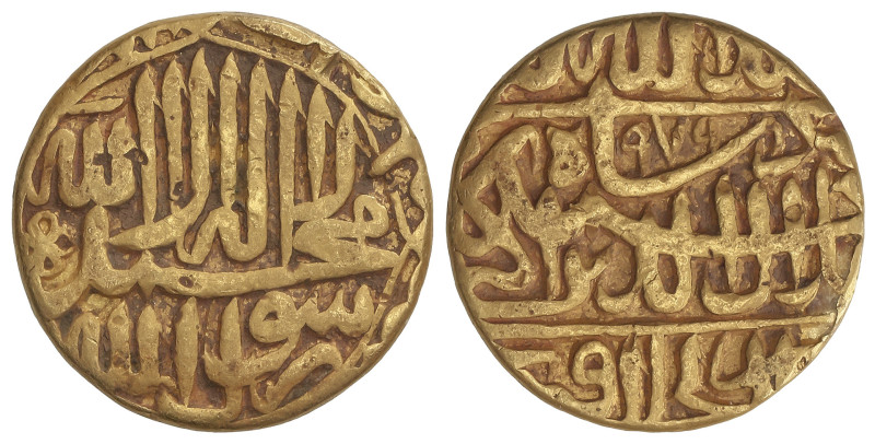 WORLD COINS: INDIA
Mohur. 979H. IMPERIO MOGHUL. MUHAMMAD AKBAR. DAR AL-KHILAFAT...