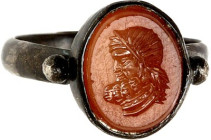 OBJEKTE AUS BRONZE. 
SCHMUCK. 
FINGERRINGE. Gemmenring flacher Ag- Reif mit aufgesetzter hochovaler Ringplatte, Karneolgemme Spiegel plan 11,5 / 9,5...