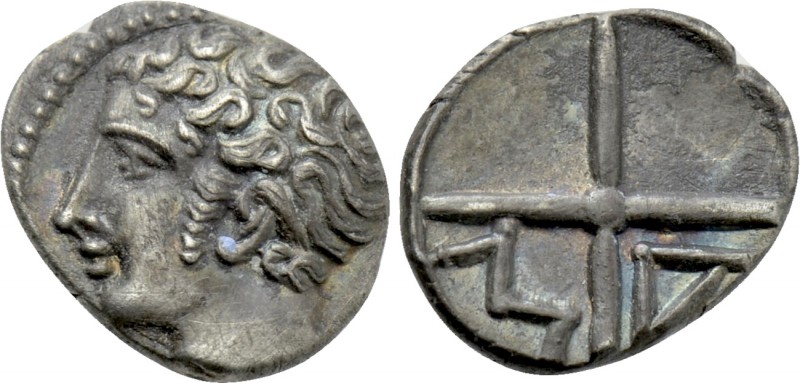 GAUL. Massalia. Obol (Circa 100-50 BC). 

Obv: Bare head of Apollo left.
Rev:...