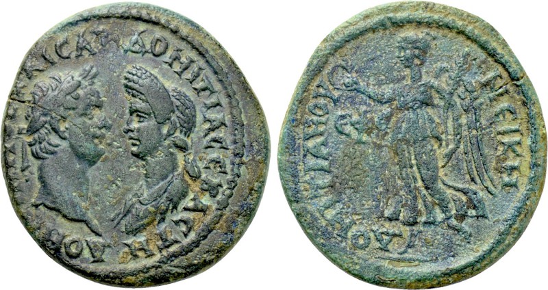 IONIA. Ephesus. Domitian with Domitia (81-96). Ae.

Obv: ΔOMITIANOC KAICAP ΔOM...