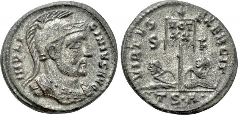 LICINIUS I (308-324). Follis. Thessalonica. 

Obv: IMP LICINIVS AVG. 
Helmete...