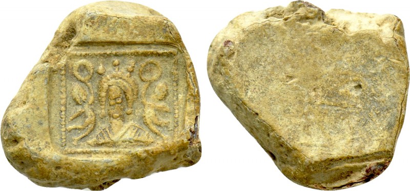 UNCERTAIN (Circa 5th century). PB Seal. 

Obv: Diademed and draped facing bust...