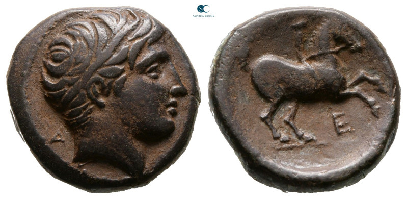 Kings of Macedon. Uncertain mint. Philip II of Macedon 359-336 BC. 
Bronze Æ
...