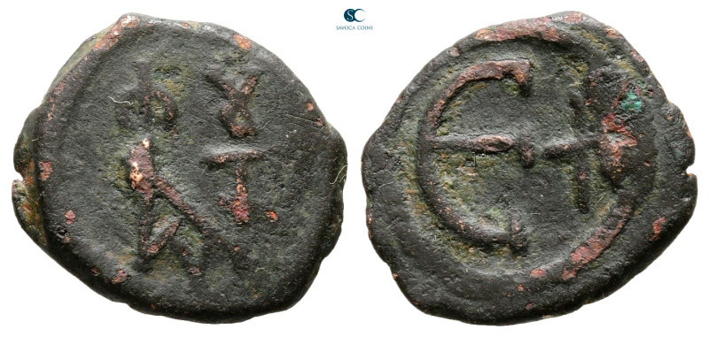 Justin II AD 565-578. Antioch
Pentanummium Æ

16 mm, 2,20 g



Nearly Ver...