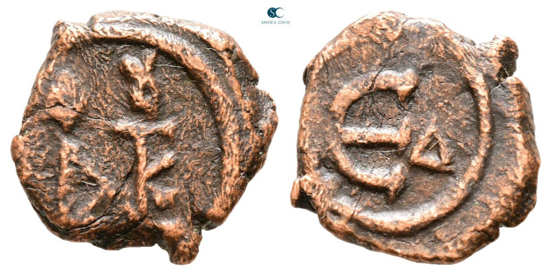 Justin II AD 565-578. Constantinople
Pentanummium Æ

15 mm, 1,59 g



Ver...