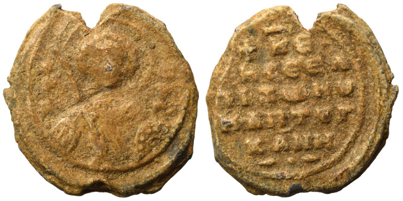 Byzantine seal (lead, 5.63 g, 22 mm). Bust of saint facing. Rev. Legend in five ...