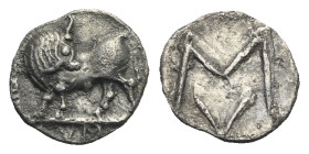 LUCANIA. Sybaris. Circa 550-510 BC. Obol (Silver, 9.15 mm, 0.36 g). Bull standing left, his head turned back to right; in exergue, VM. Rev. Large M ab...
