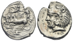 SICILY. Kamarina. Circa 425-405 BC. Tetradrachm (Silver, 29.53 mm, 17.17 g) Athena wearing chiton and crested helmet standing left, driving fast quadr...