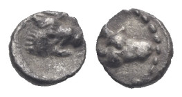 CARIA. Uncertain. Circa 450-400 BC. Tetartemorion (Silver, 5.60 mm, 0,17 g). Forepart of a roaring lion. Rev. Ram's head (?). Cf. HN Online 967. Cf. S...
