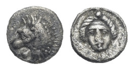 SATRAPS OF CARIA. Hekatomnos, 395-377 BC. Tetartemorion (Silver, 5.95 mm, 0.24 g). Mylasa circa 390-380 BC. Head of roaring lion left protruding tongu...