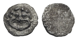 CILICIA. Uncertain mint. Circa 4th century BC. Tetartemorion (Silver, 6.23 mm, 0.22 g). Head of gorgoneion facing protruding tongue. Rev. Blank surfac...