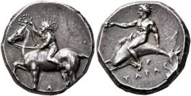 CALABRIA. Tarentum. Circa 385-380 BC. Didrachm or Nomos (Silver, 20 mm, 7.86 g, 4 h). Nude youth riding horse walking to left, crowning the horse's he...