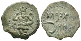 Ebusus. Semis. 20 a.C. Ibiza. (Abh-946). Anv.: Bes con martillo y serpiente, a su izquierda letra púnica alef. Rev.: Leyenda púnica. Ae. 6,27 g. EBC. ...