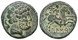 Bolskan. As. 180-20 a.C. Huesca. (Abh-1918). (Acip-1419). (C-4). Anv.: Cabeza barbada a derecha, detrás delfín. Rev.: Jinete con lanza a derecha, enci...