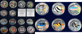 Alle Welt: Kolorierte Münzen. Dabei 6 x 500 Won 1996 Fische, 1 Unze Farb- Silbermünzen im Gesamtetui sowie Kassette mit 14 kolorierten Münzen aus Silb...