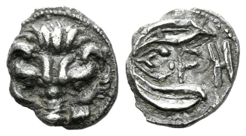 Bruttium, Rhegium Litra crica 425-420, AR 10.00 mm., 0.64 g.
Facing lion's mask...