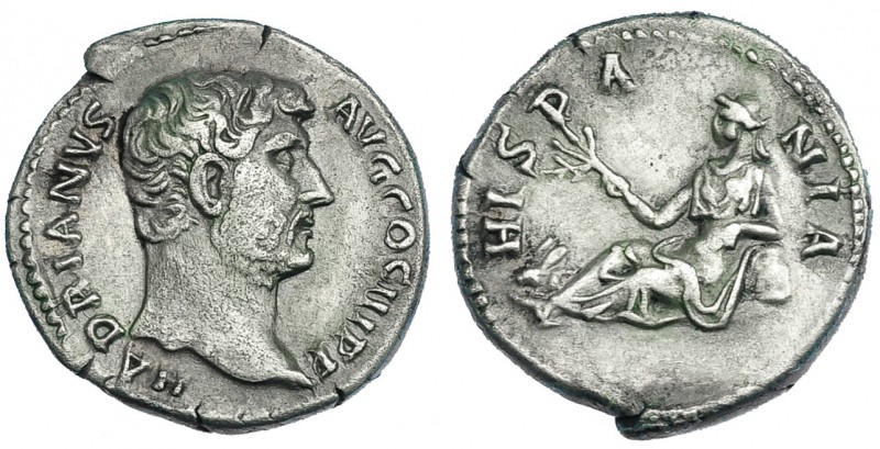 ADRIANO. Denario. Roma (132). R/ Hispania reclinada a izq., sosteniendo rama y c...