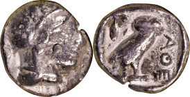 ATTICA. Athens. AR Tetradrachm, ca. 454-404 B.C. NGC Genuine. Test Cut.
HGC-4, 1597; Kroll-8. Obverse: Helmeted head of Athena right; Reverse: Owl st...