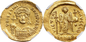 JUSTINIAN I, 527-565. AV Solidus (4.49 gms), Constantinople Mint, 9th Officina, 537-542. NGC Ch AU, Strike: 4/5 Surface: 4/5.
S-139. Obverse: Helmete...