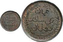 MUSCAT AND OMAN. 1/4 Anna, AH 1315 (1897). Birmingham (Heaton) Mint. Faisal bin Turki. PCGS MS-62 Brown.
KM-3.1. A most impressive Mint State issue f...