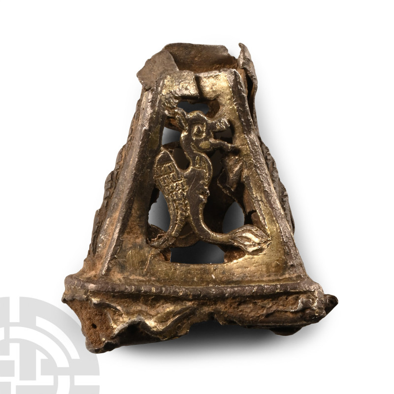 Circa 12th century A.D. Pyramidal mount with two broad openwork trapezoidal pane...